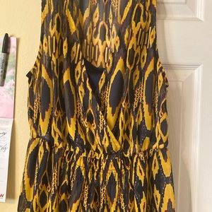 Princess verifying black and yellow dress